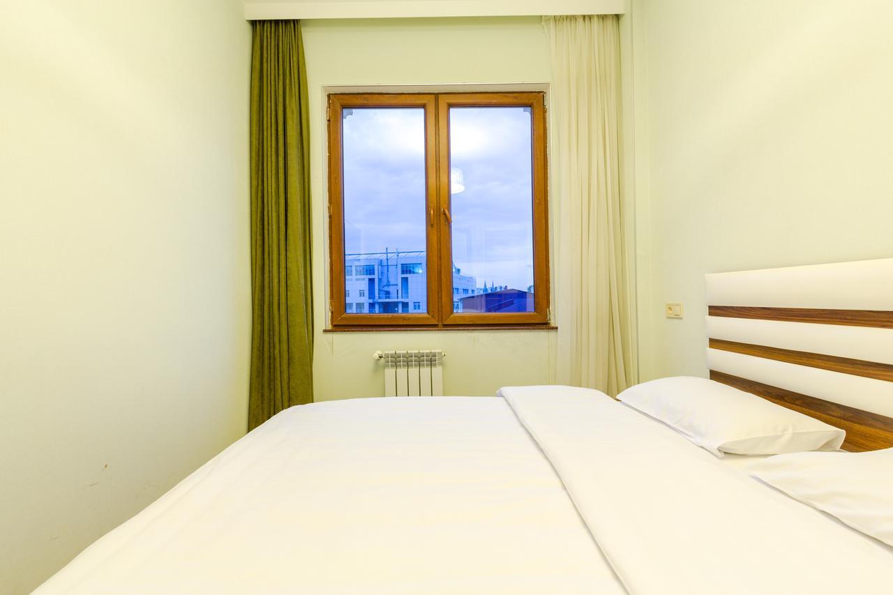 Odisea Apart Hotel Батуми Номер фото
